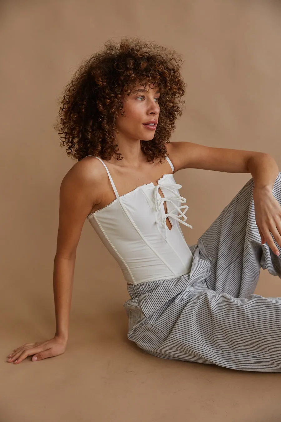 Amelie Eyelet Trim Bow Corset Top air move