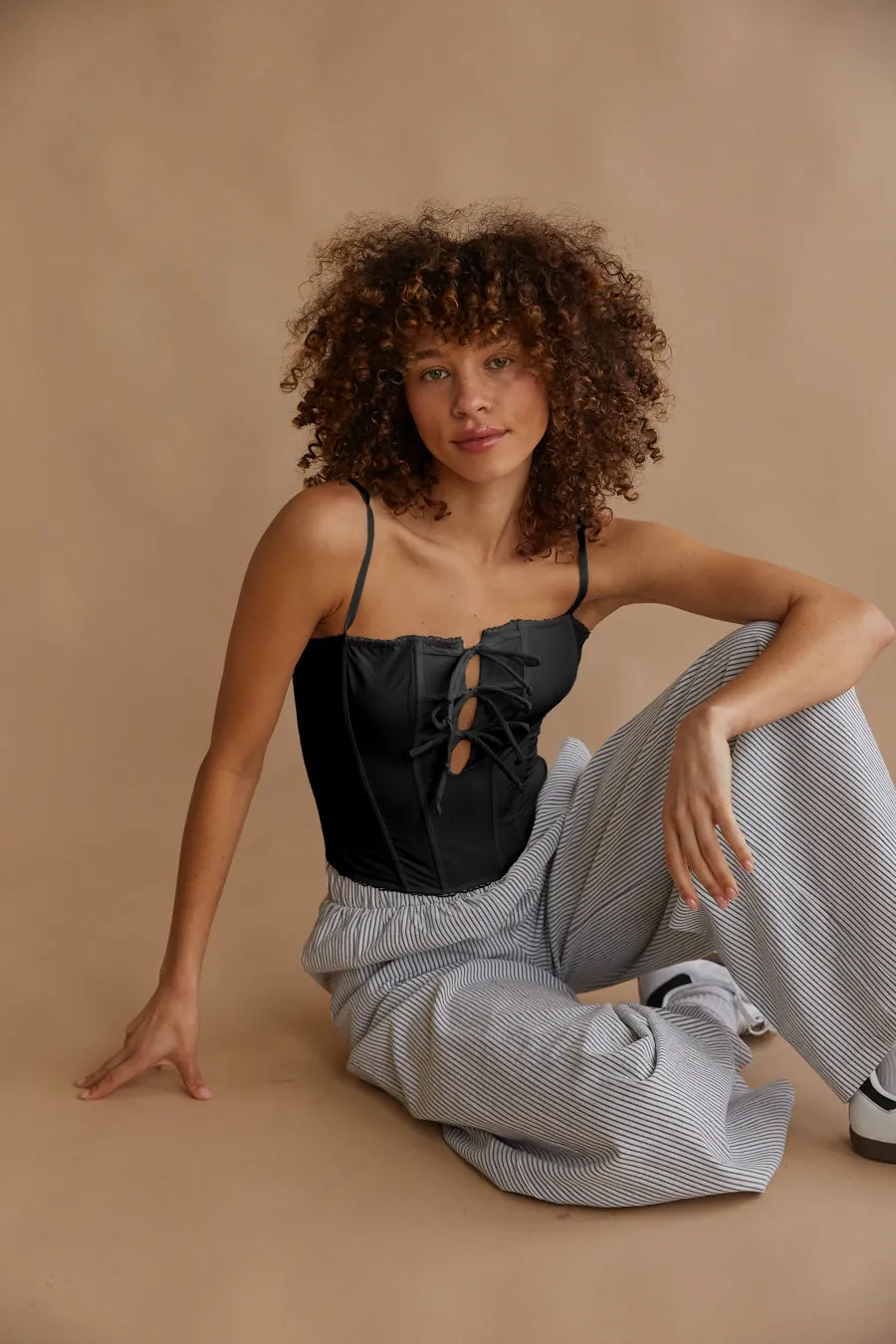 Amelie Eyelet Trim Bow Corset Top air move