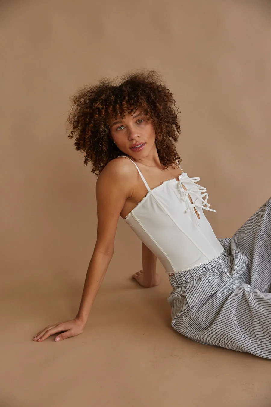 Amelie Eyelet Trim Bow Corset Top air move