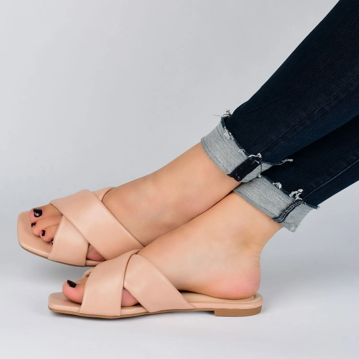 CARLOTTA SLIDE SANDALS IN FAUX LEATHER heel arch