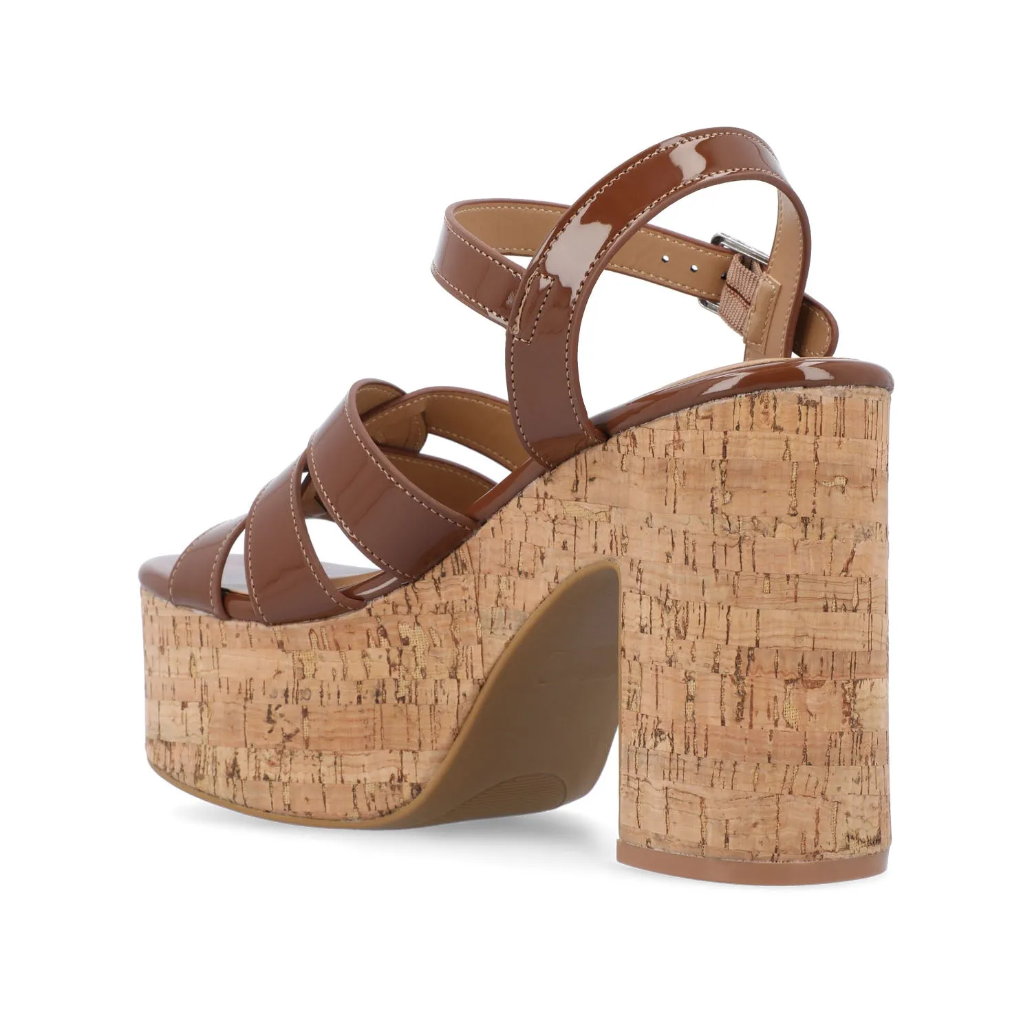JANIA BLOCK HEELED SANDALS IN PATENT travel light