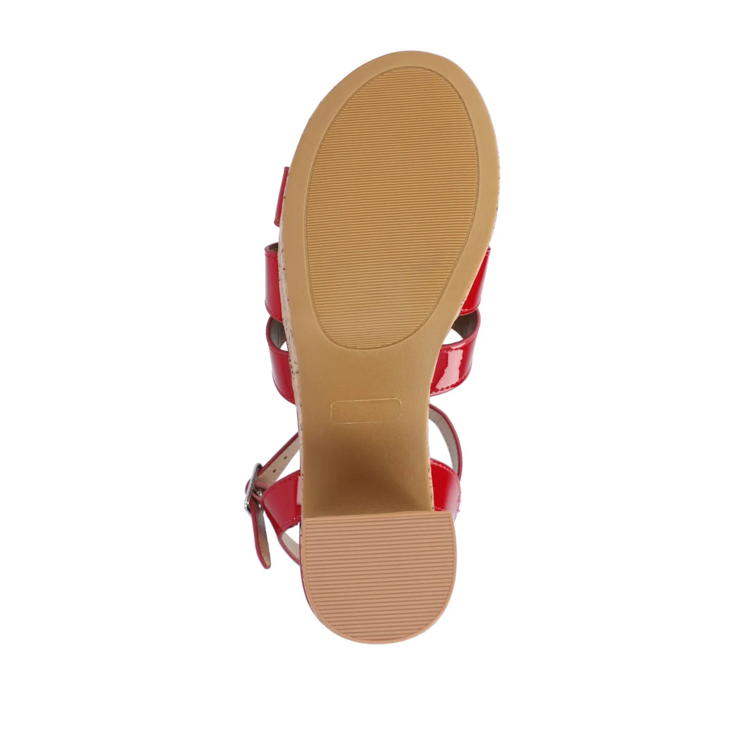 JANIA BLOCK HEELED SANDALS IN PATENT travel light