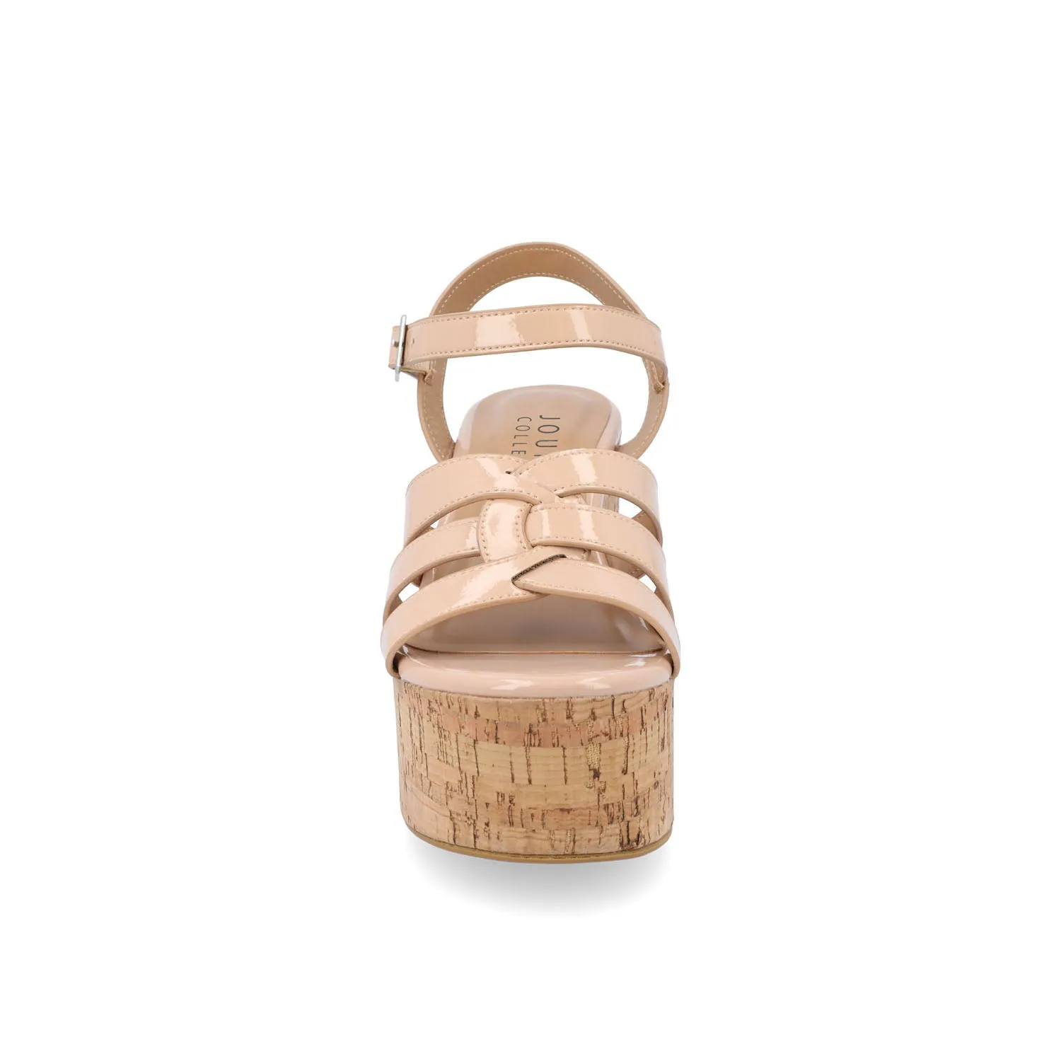 JANIA BLOCK HEELED SANDALS IN PATENT travel light