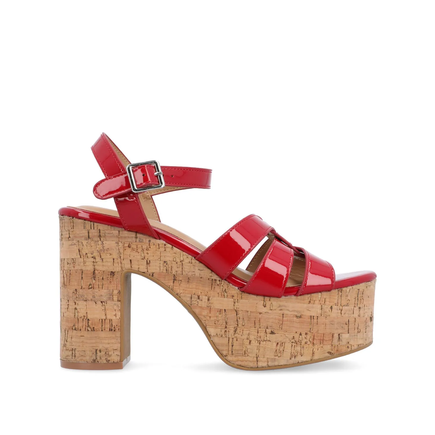 JANIA BLOCK HEELED SANDALS IN PATENT travel light