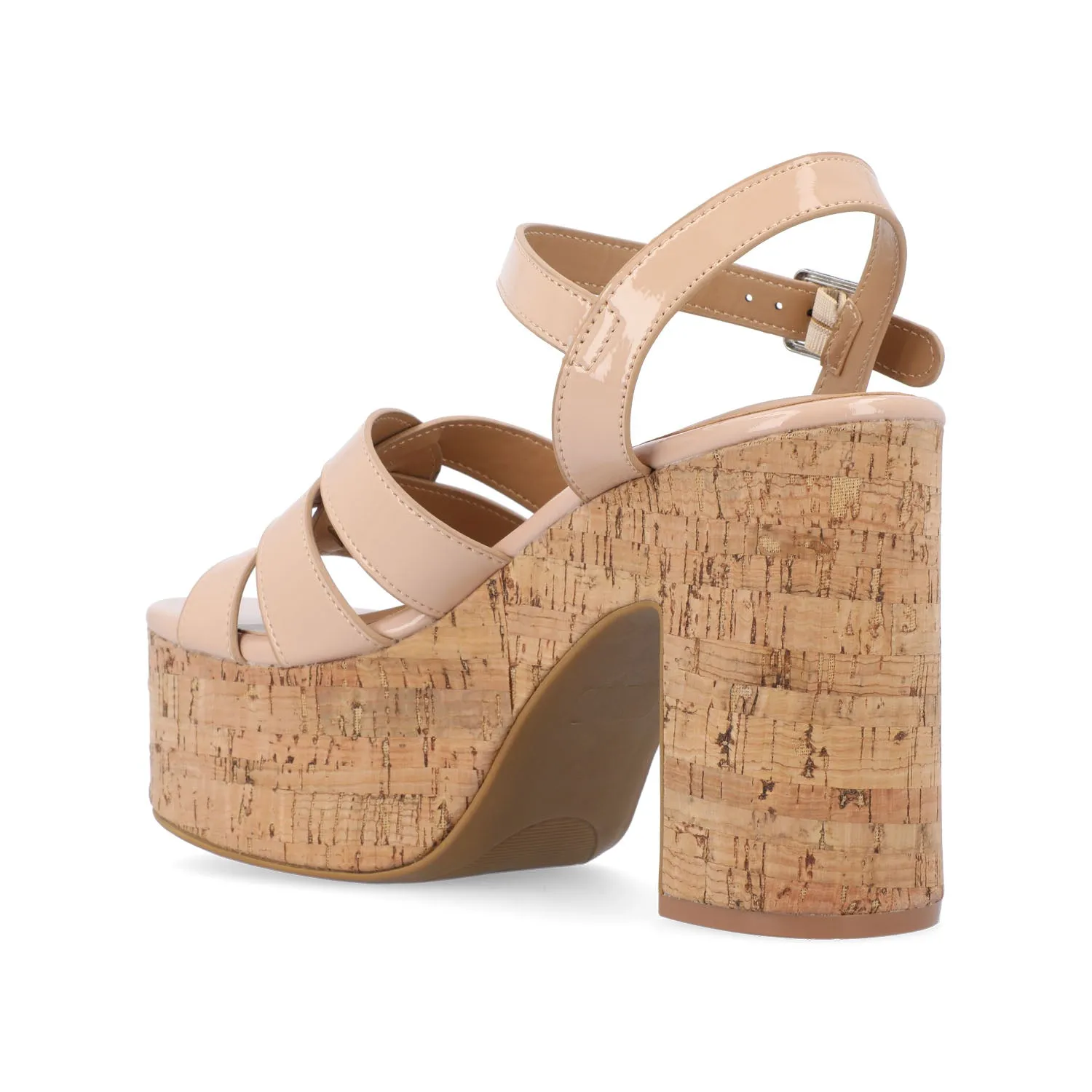 JANIA BLOCK HEELED SANDALS IN PATENT travel light