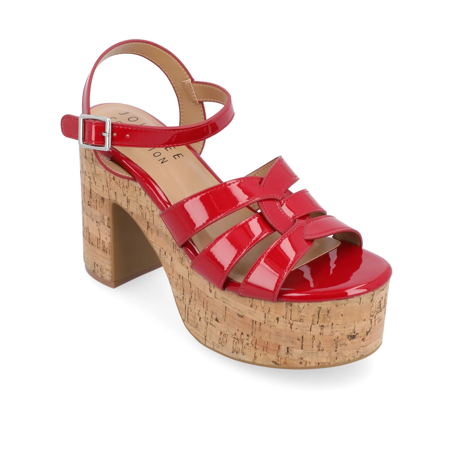 JANIA BLOCK HEELED SANDALS IN PATENT travel light