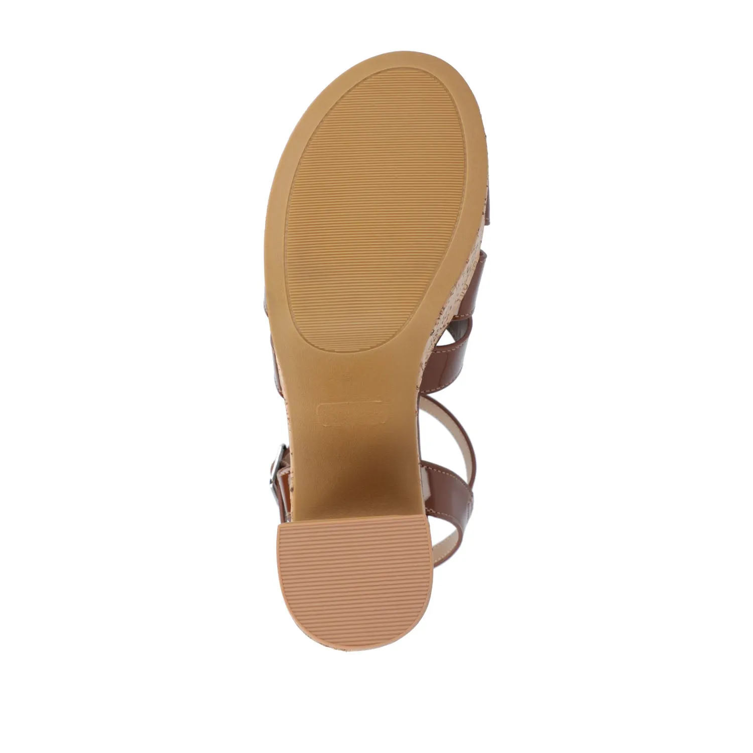 JANIA BLOCK HEELED SANDALS IN PATENT travel light
