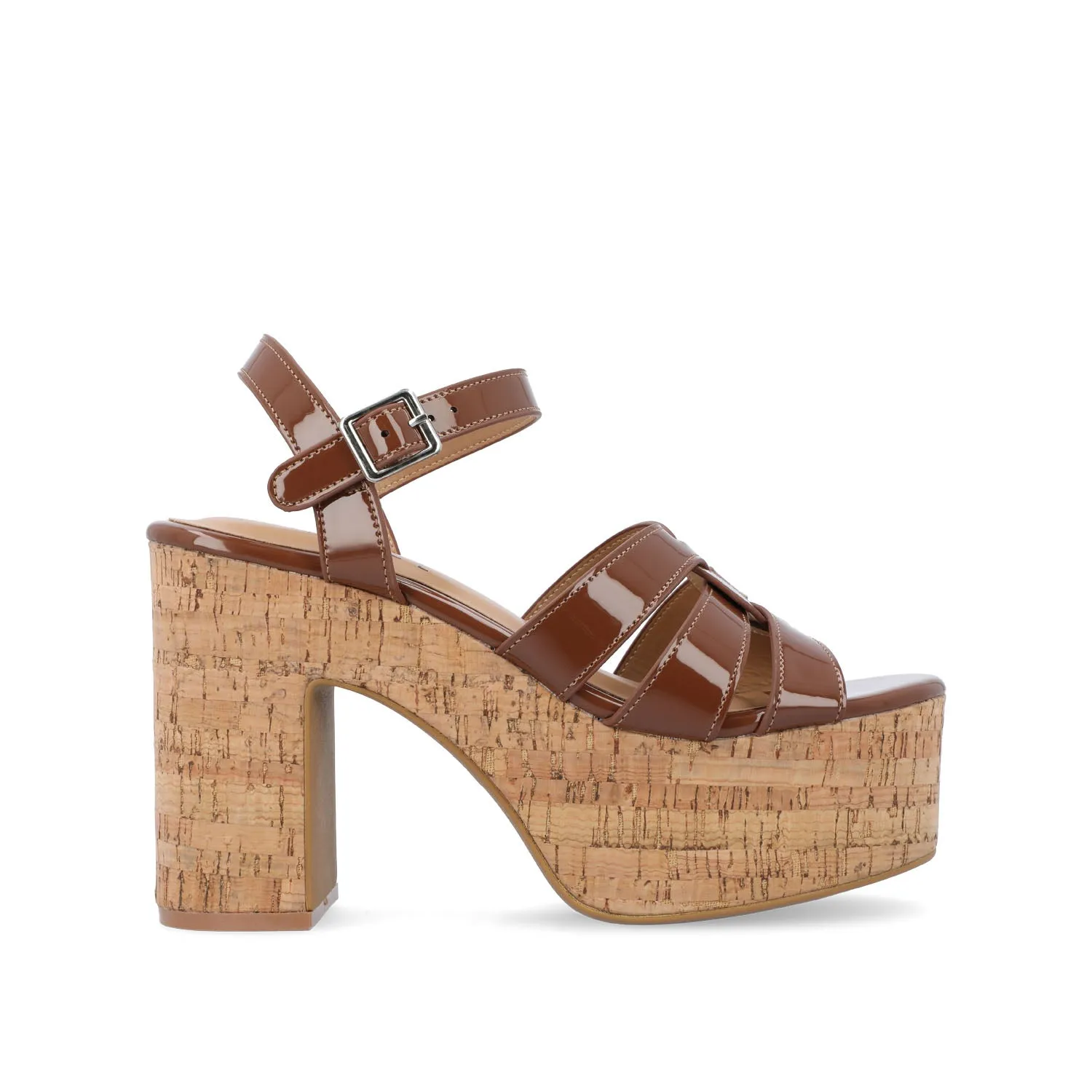 JANIA BLOCK HEELED SANDALS IN PATENT travel light
