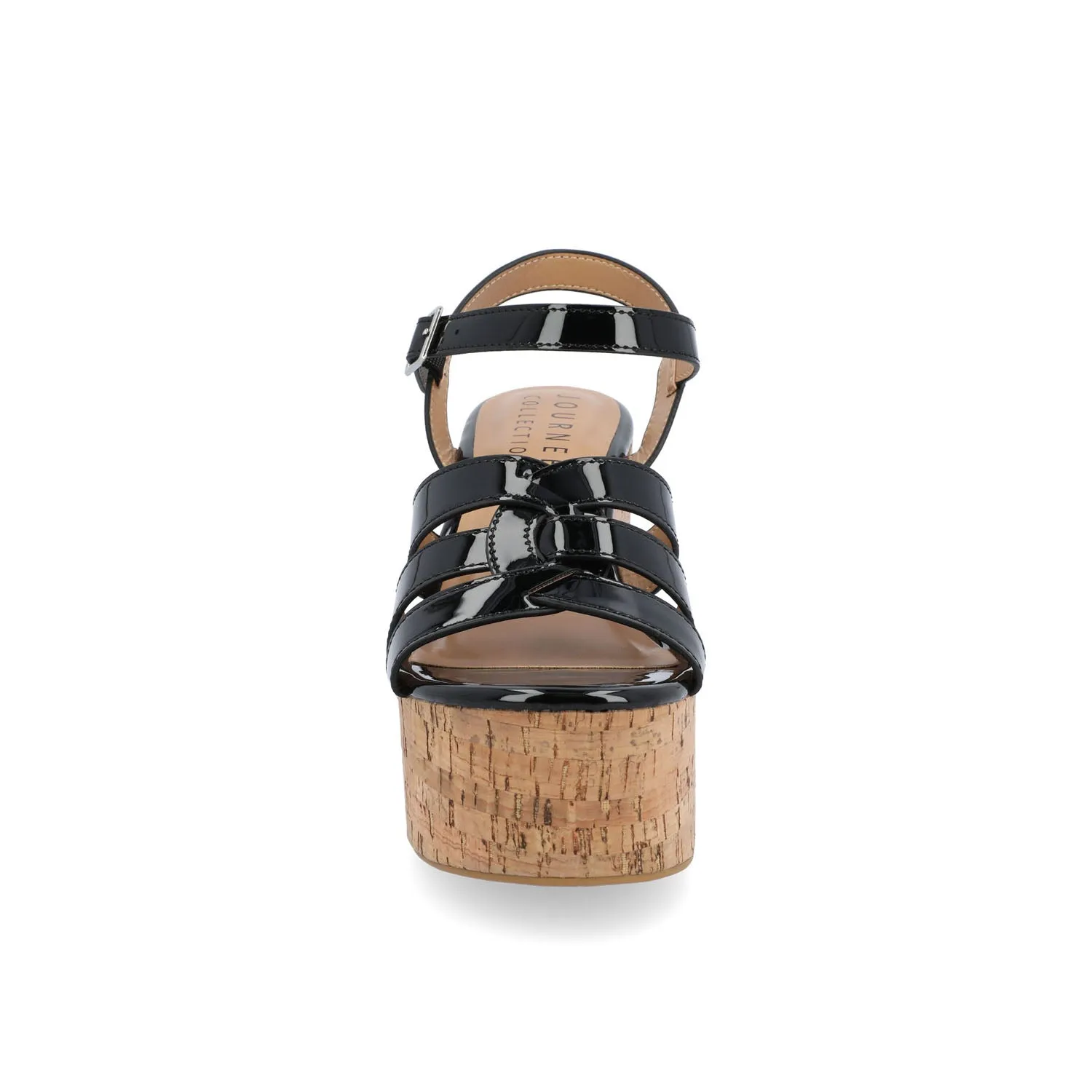 JANIA BLOCK HEELED SANDALS IN PATENT travel light