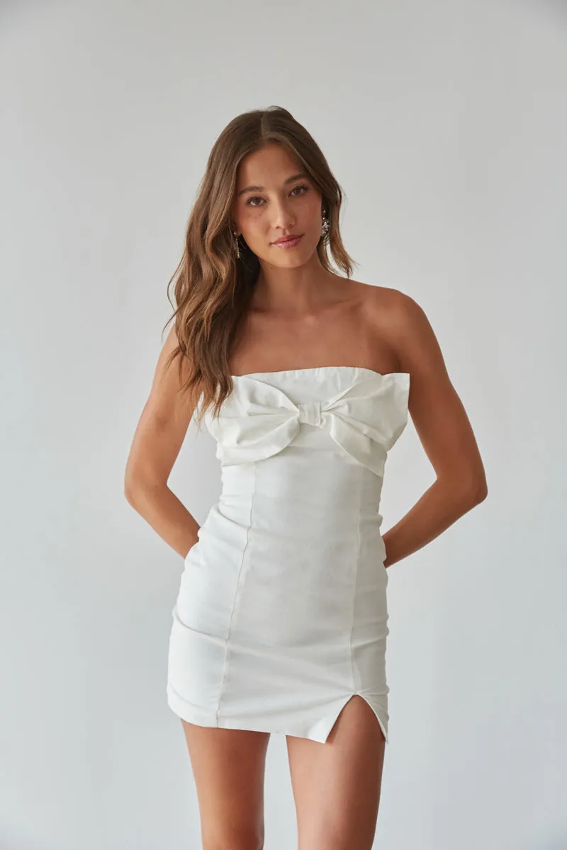 Mina Strapless Bow Bodycon Mini Dress pose chic