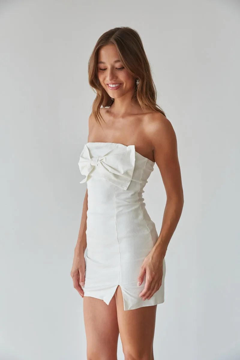 Mina Strapless Bow Bodycon Mini Dress pose chic