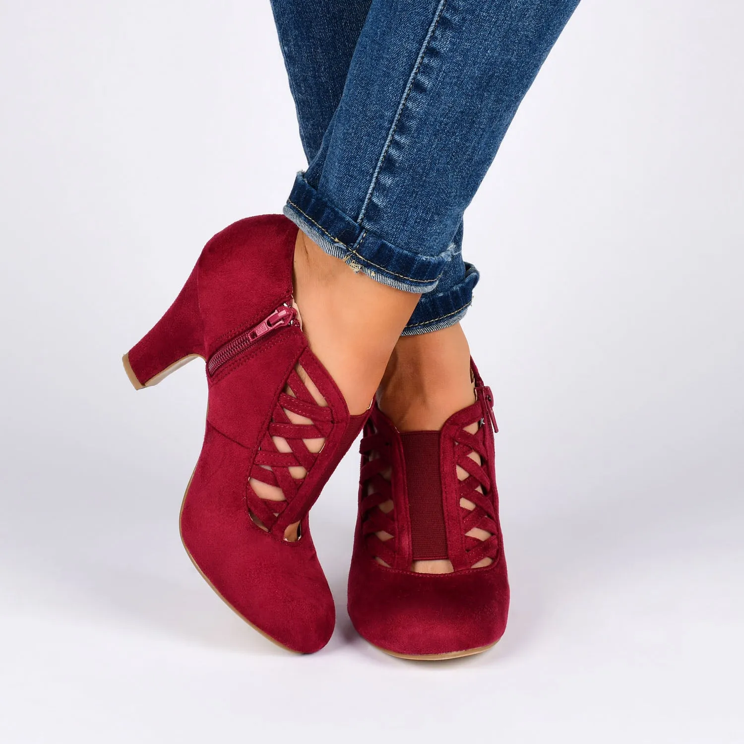 PIPER CONE HEELED BOOTIES IN FAUX SUEDE leather grain