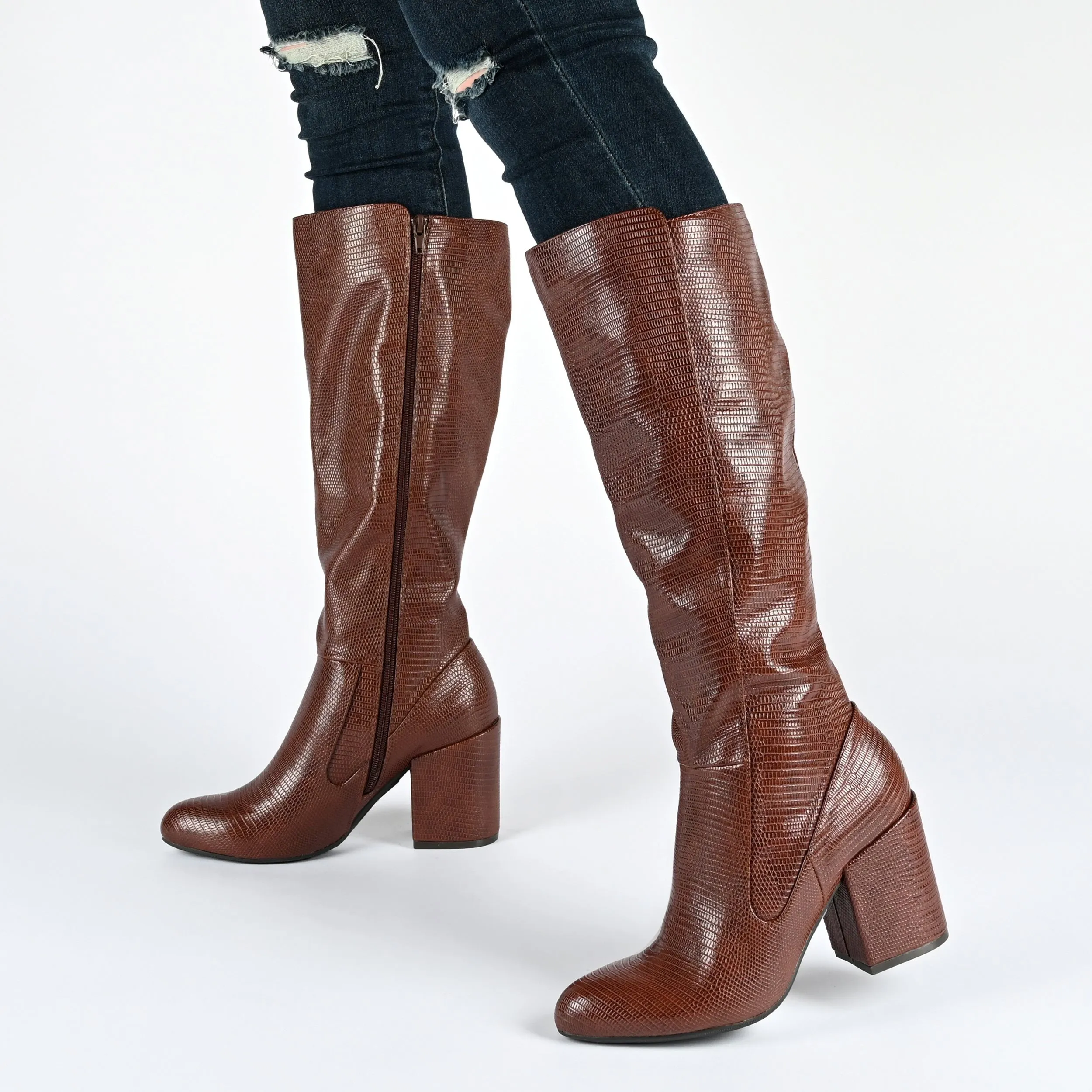 TAVIA KNEE-HIGH BOOTS IN FAUX LEATHER style kick